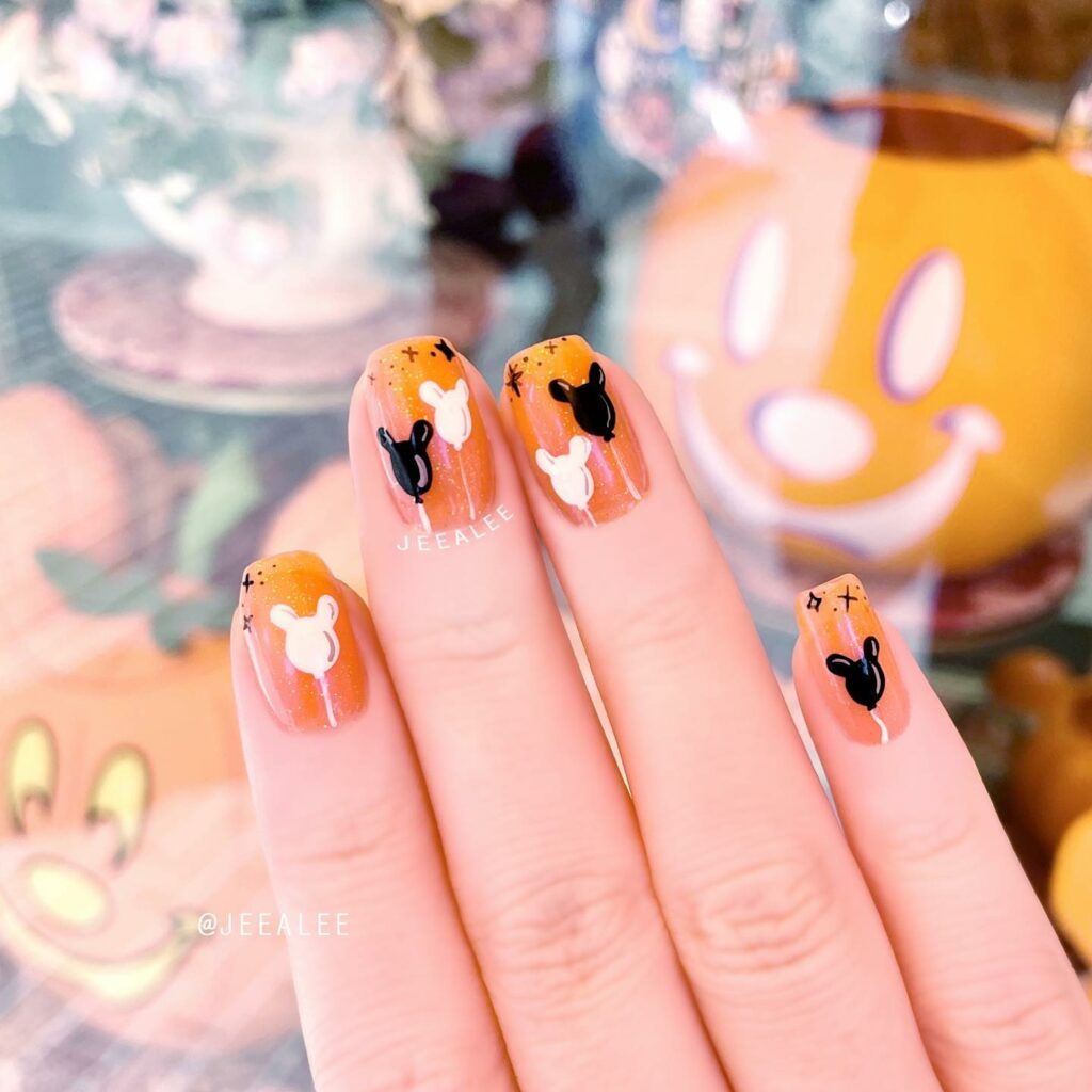 Citrus-Toned Mickey Mouse Nails