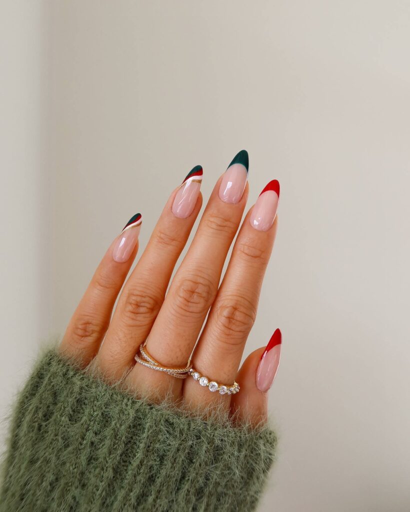 Festive Red Accents on Green Christmas Nails
