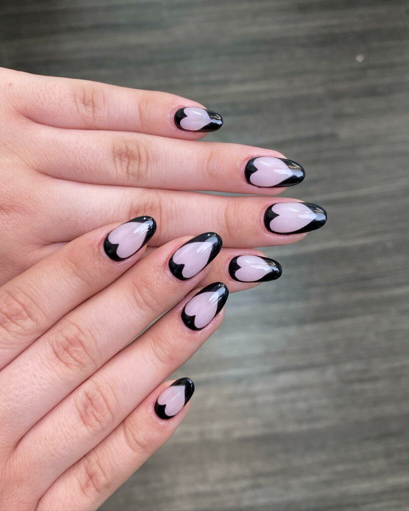 Sculpted Short Black French Nails with a Curvaceous Flair