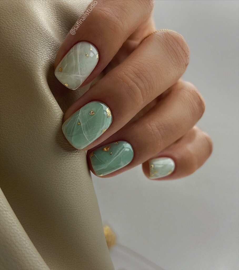Delicate Short Mint Green Nails with Gold Foils
