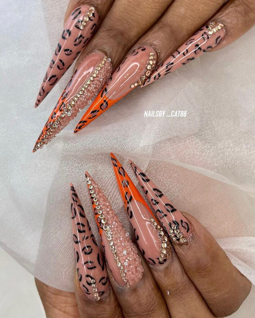 Sleek Cheetah Nail Elegance with a Sparkling Touch
