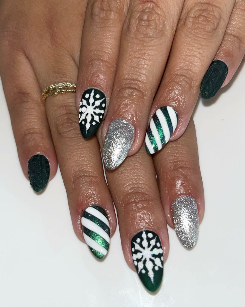 Delicate Snowflakes on Green Christmas Nails
