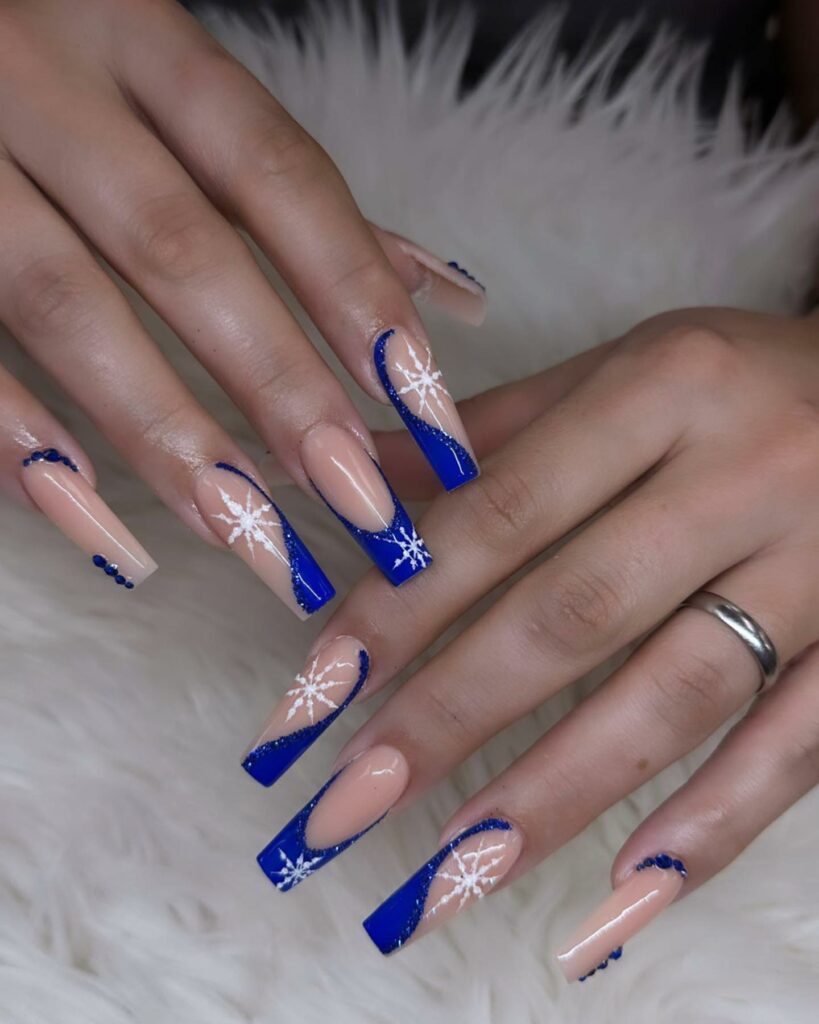 Celestial Star Patterns on Blue Coffin Nails