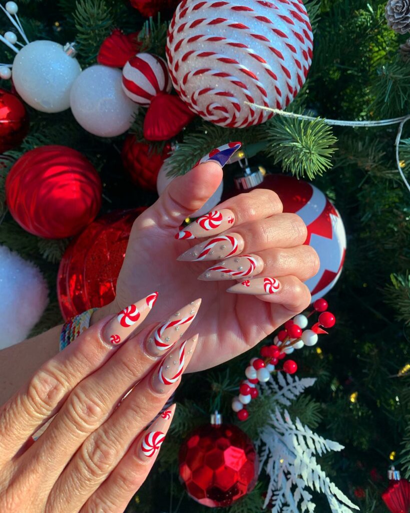 Stiletto Candy Cane Nail Art Adorned with Pearls
