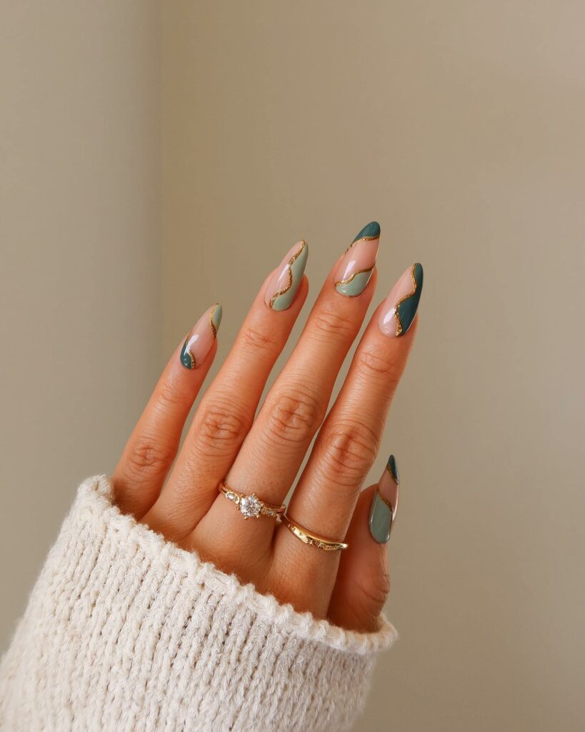 Elegant Swirl Patterns on Green Christmas Nails
