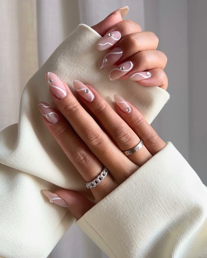 The Charm of Pink and White Almond Nail Designs