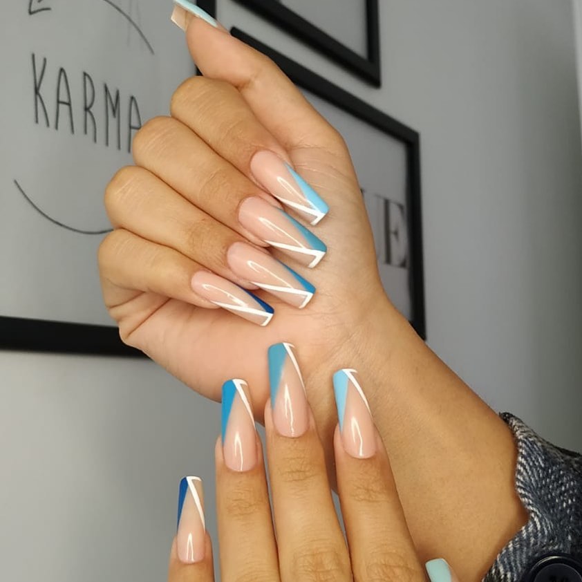 Chic V-Tip French Manicure on Blue Coffin Nails
