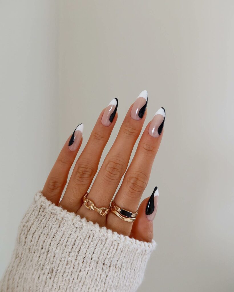 Elegance of White and Black Almond Nails