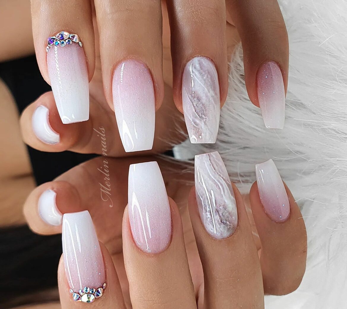 white and pink marble nails