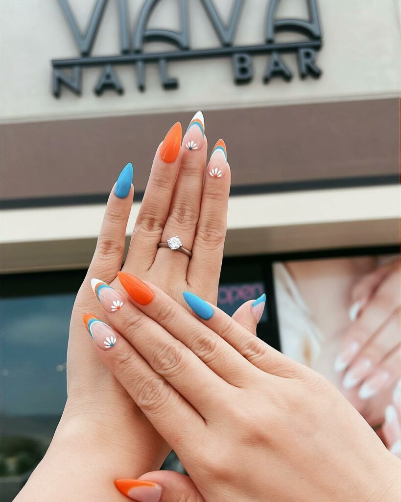 Orange And Blue Stiletto Nails With Flower