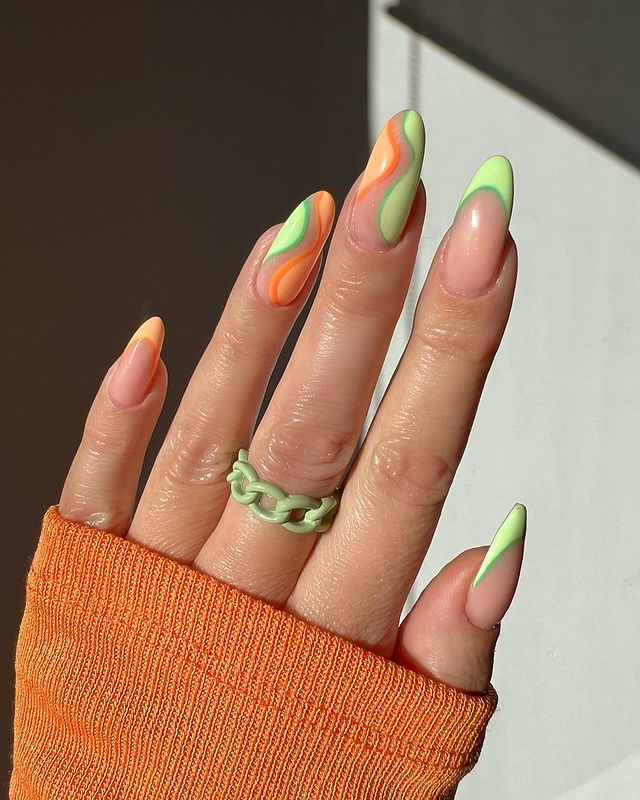 Negative Space Green And Orange Nails