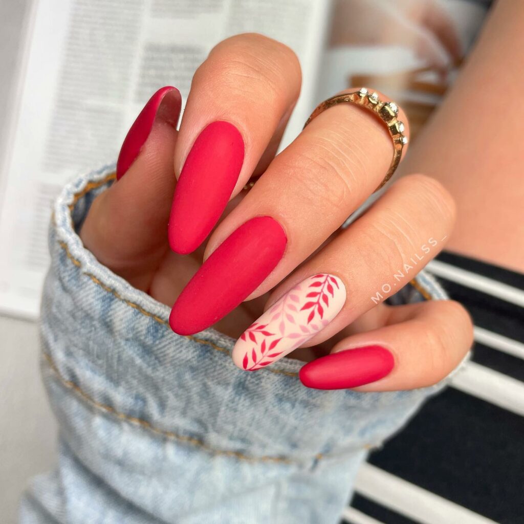 Red Matte Almond Accent Nails With Botanical Design