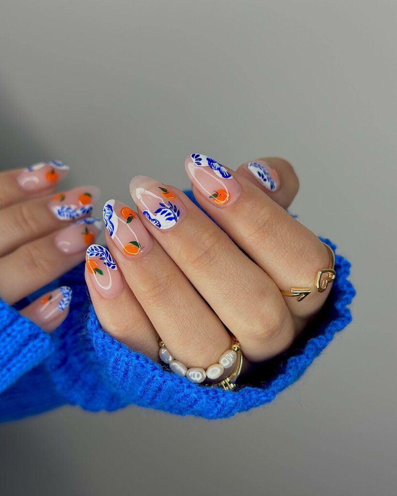 Gel Nails With Blue Flower And Fruit Orange Design