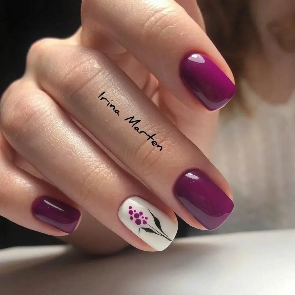 Short Dark Purple Accent Nails With Flower Design