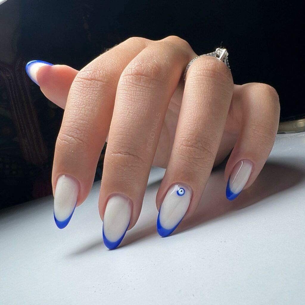 Blue And White French Nails With Evil Eye Design