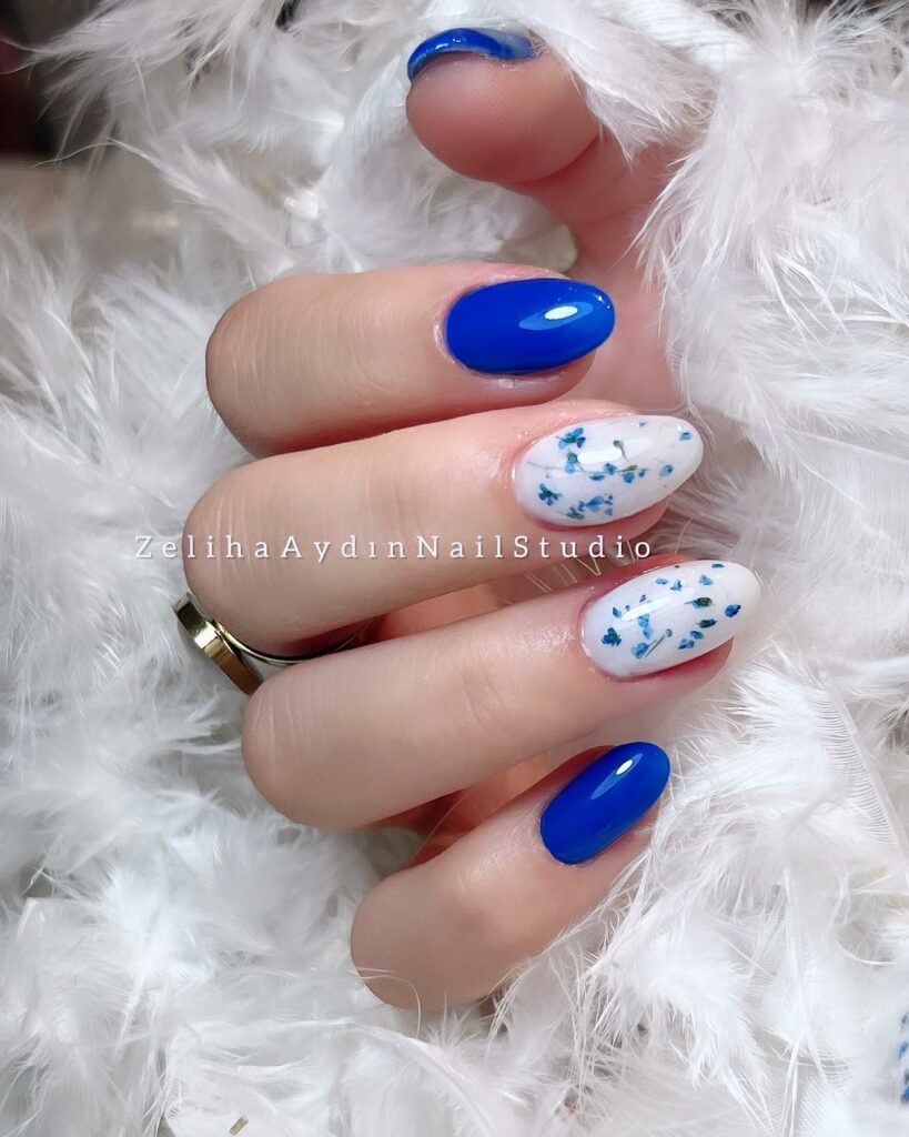 Blue And White Nails With Flower Design