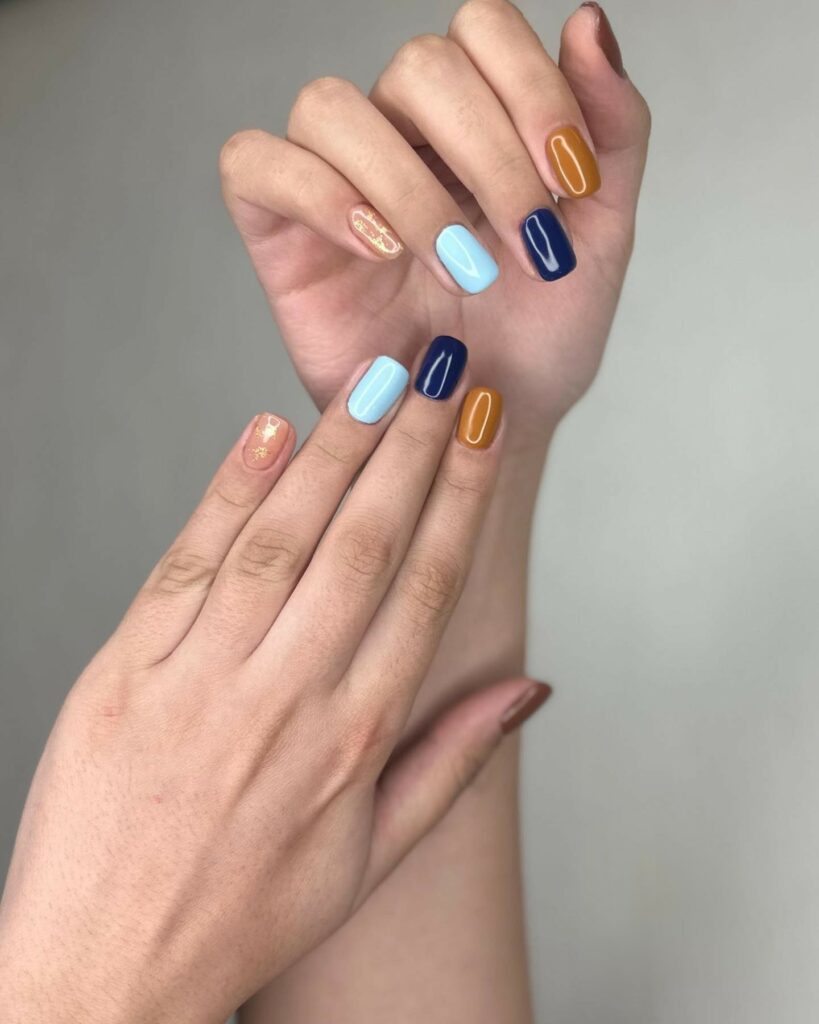 Orange And Blue Short Nails