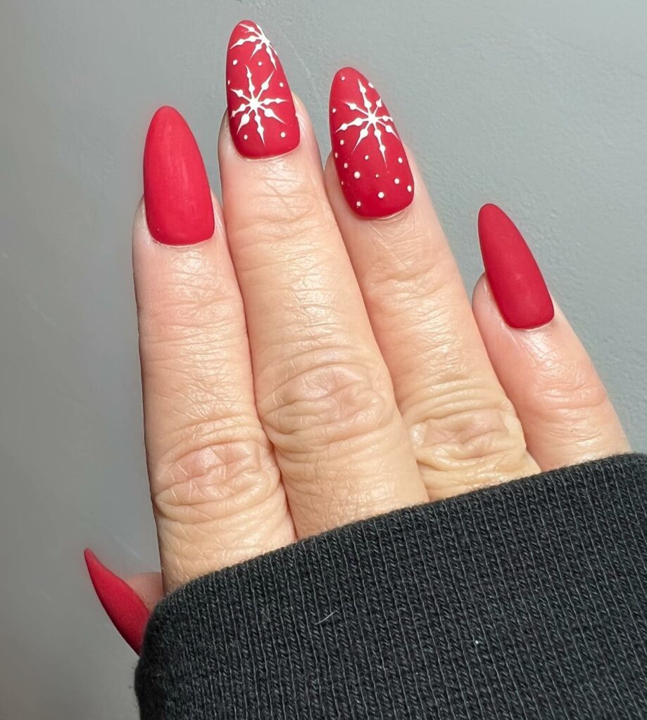 Red Matte Nails With Snow Flake Design