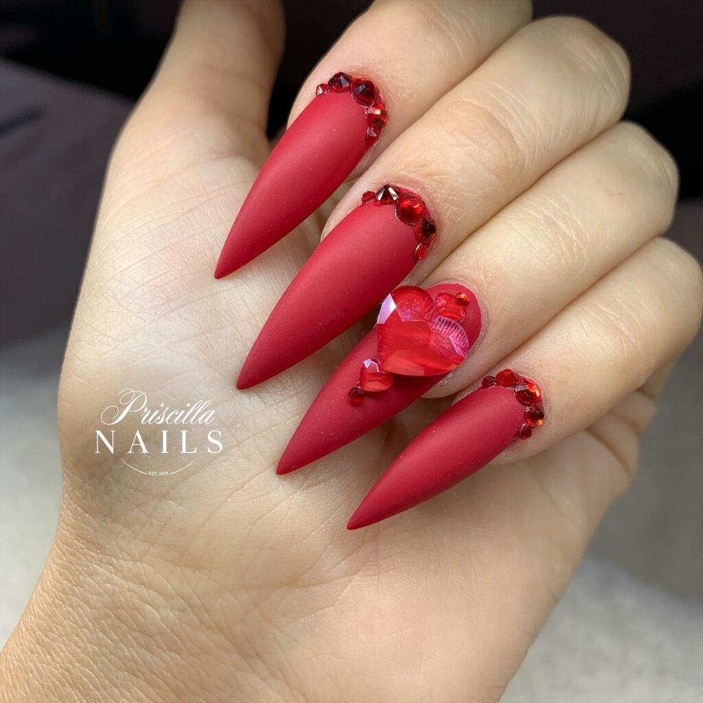Red Matte Stiletto Nails With Red Stone