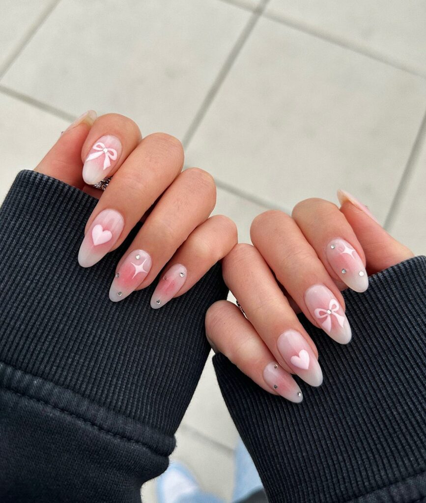 Baby Pink Nails with Heartfelt Designs