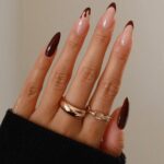Brown french tip almond nails