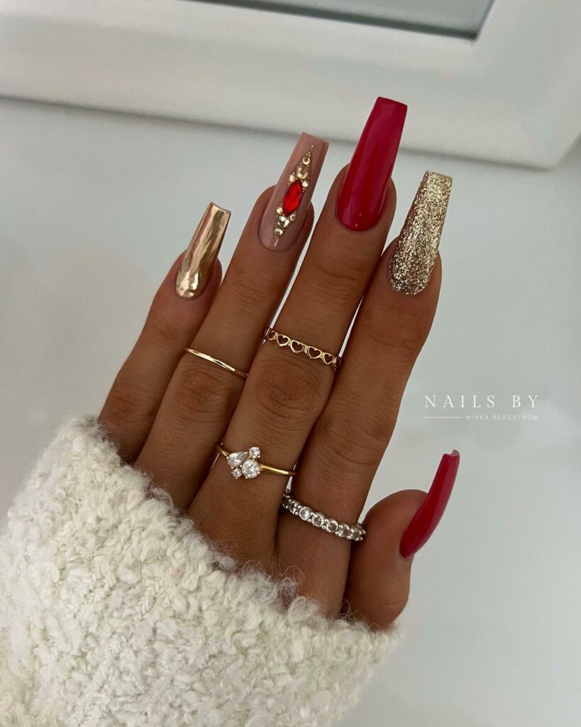 Elegant Red and Gold Christmas Nails with Gems
