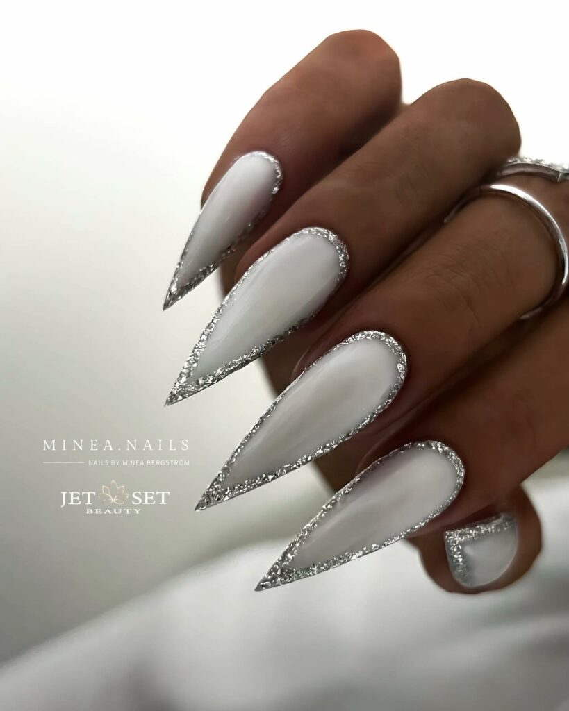 Milky White Stiletto Christmas Nails with Glitters