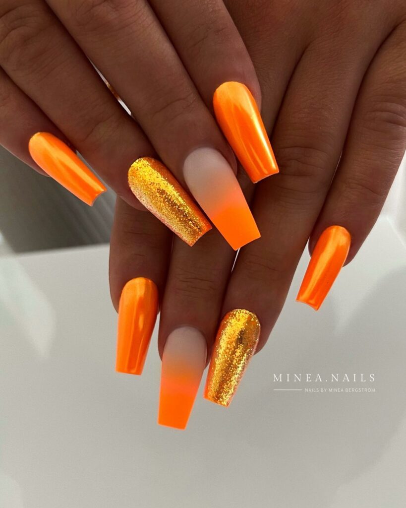 Vibrant Orange Chrome Nails with Glitters