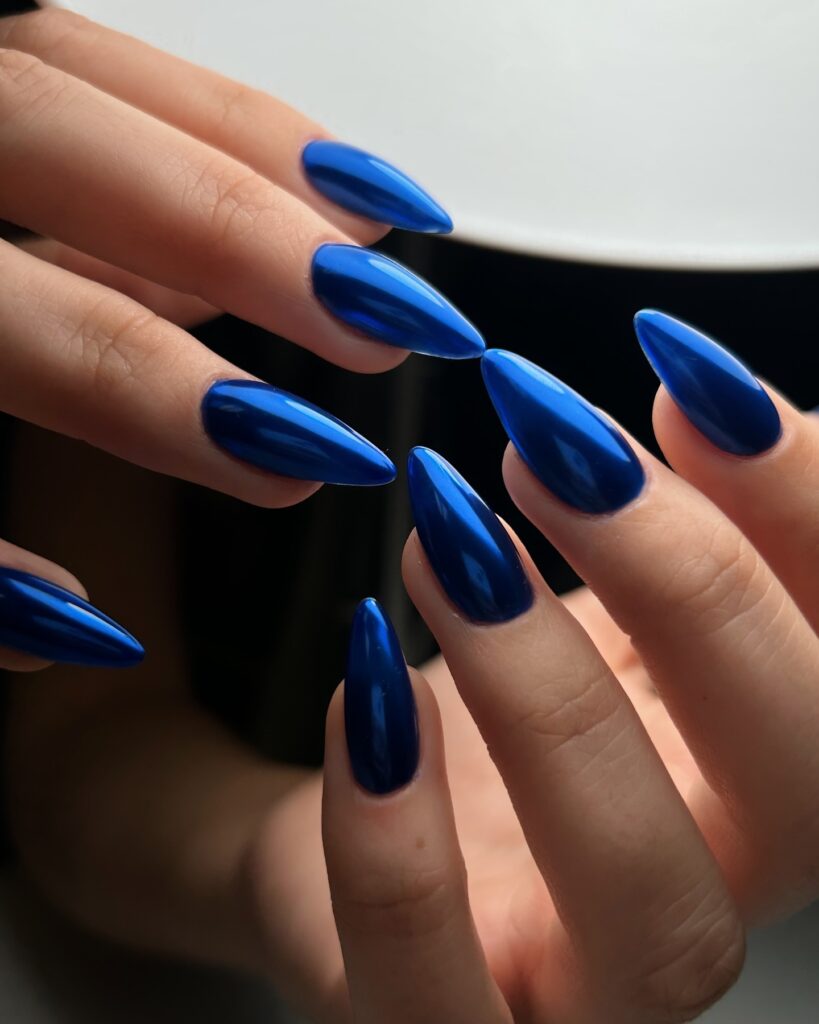 Edgy Sophistication of Stiletto Blue Chrome Nails