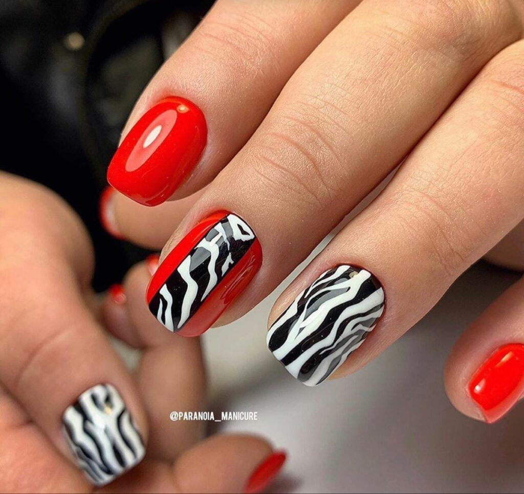 Wild Stripe Design On Red Almond Nails