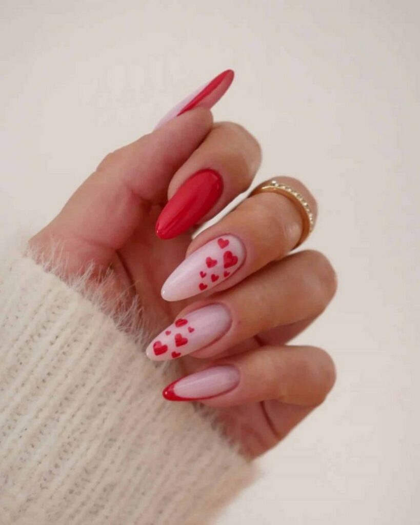 Artistic Love Affair: Oval Light Pink Nails with Red Hearts
