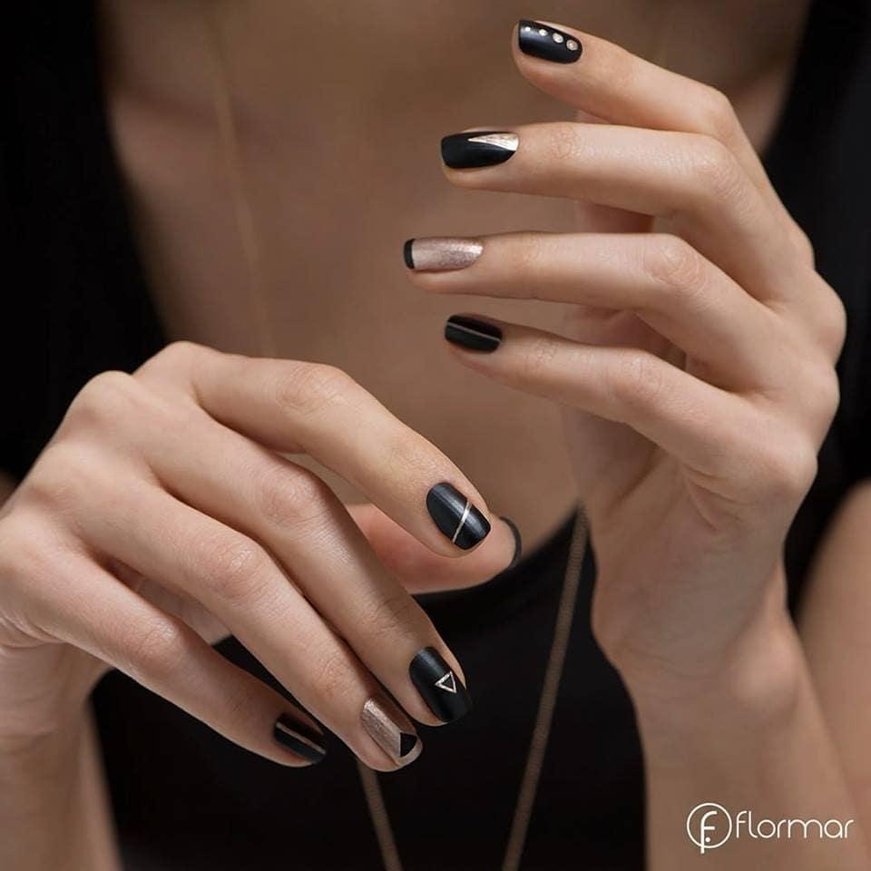 Golden Luxury: Chic Golden and Black Nails