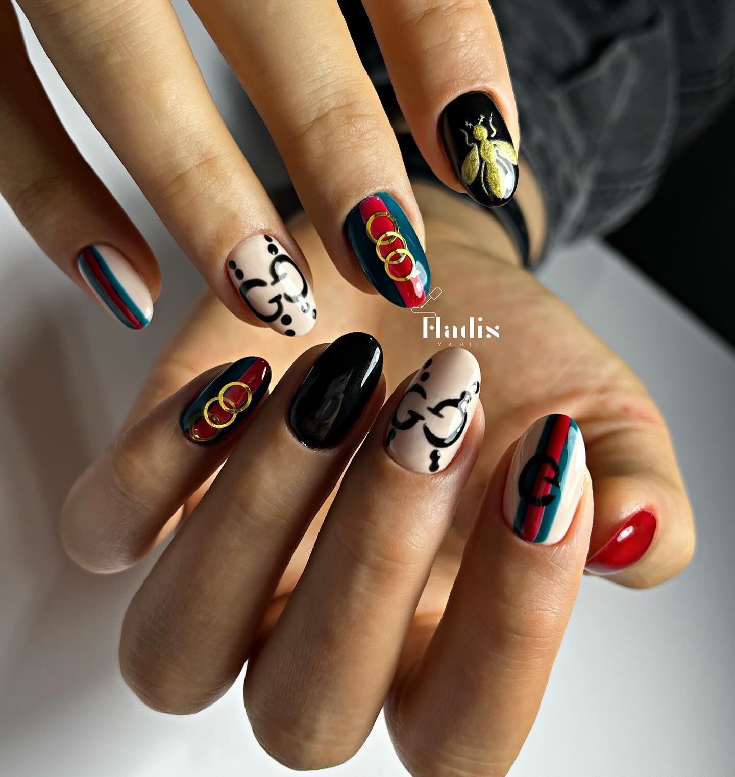 Artistic Almond Nails with Music and Nature Motifs