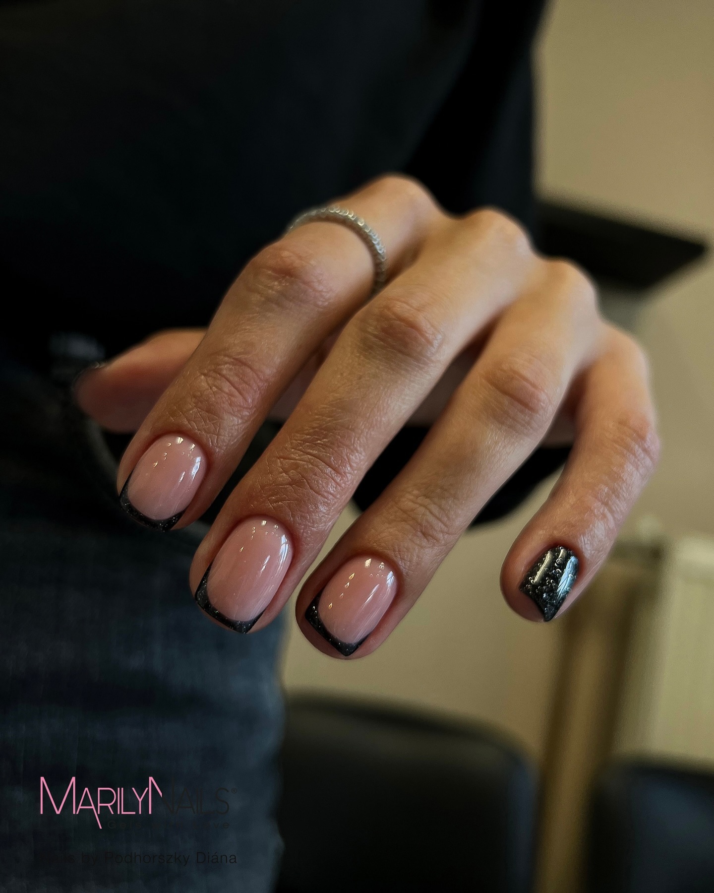 Black-tipped French Manicure with Glittery Flair