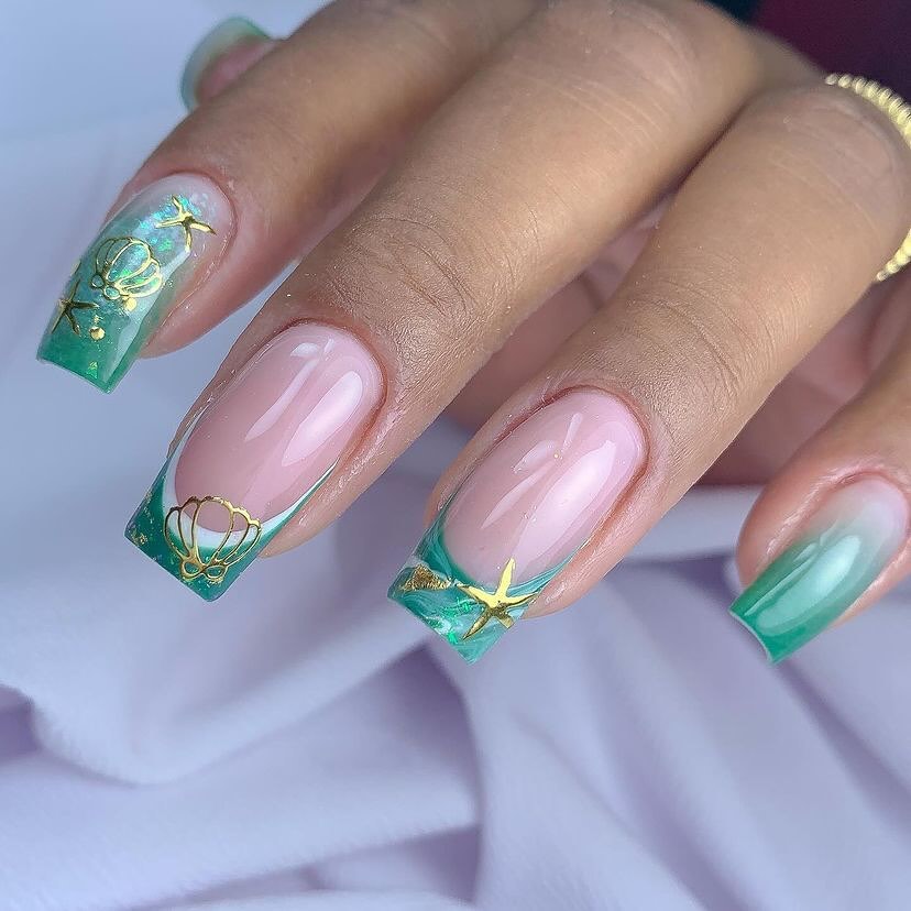 Chic Aquatic Themed Nails with Star Charms
