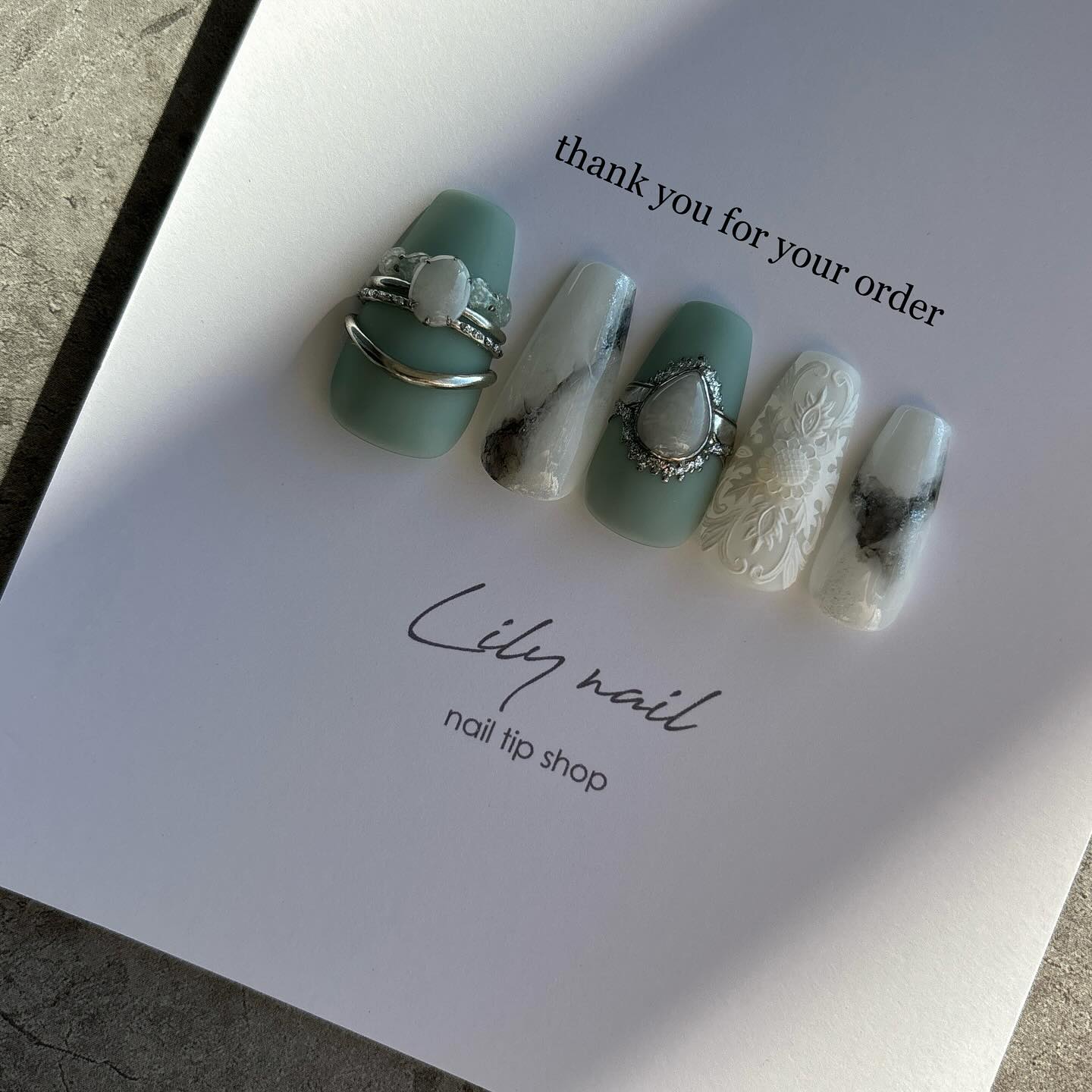 Chic Sage and Marble Floral Nail Design