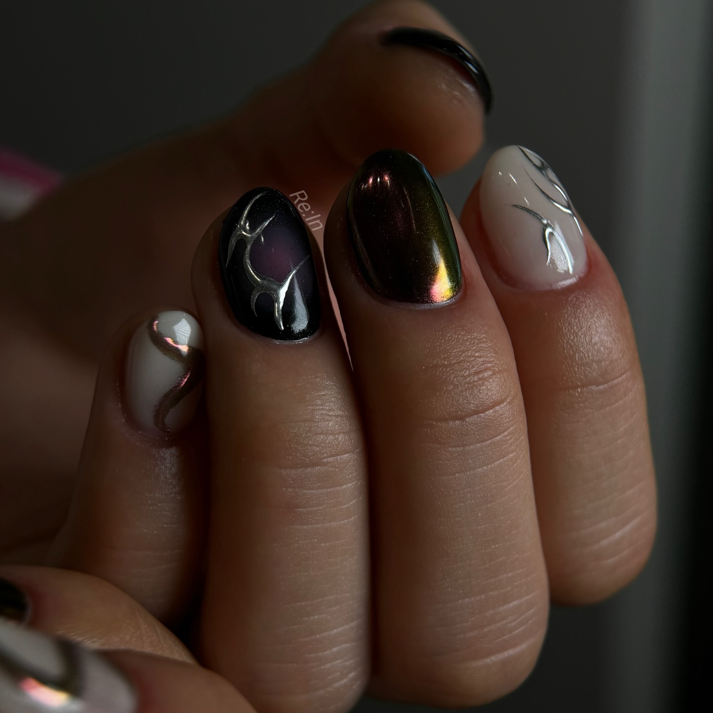 Elegant Chrome and Abstract Art Nail Inspiration