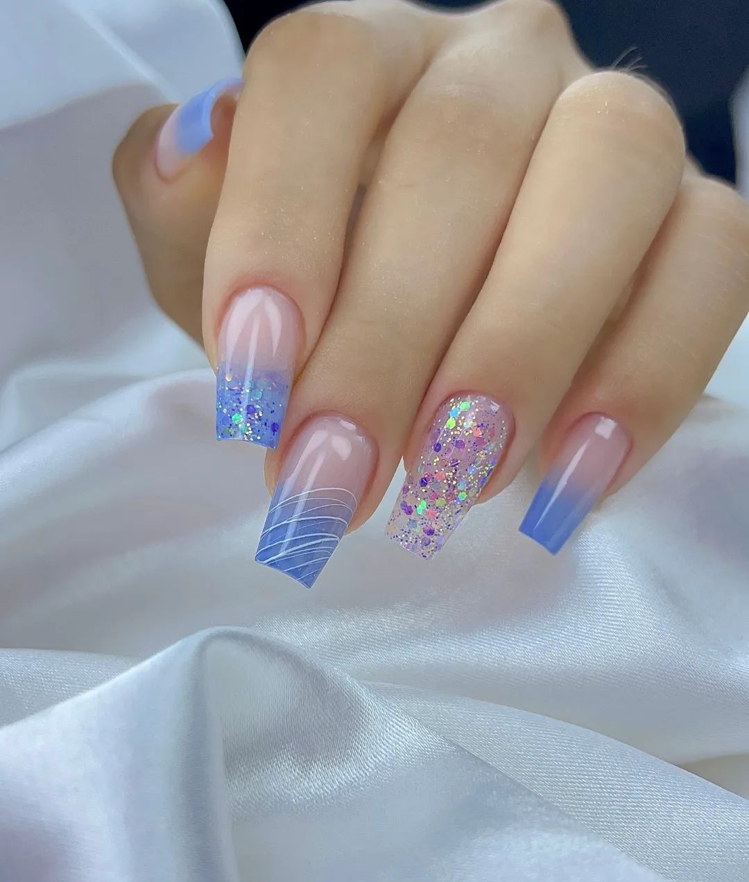 Elegant Pastel Blue to Lilac Glitter Ombre Nails