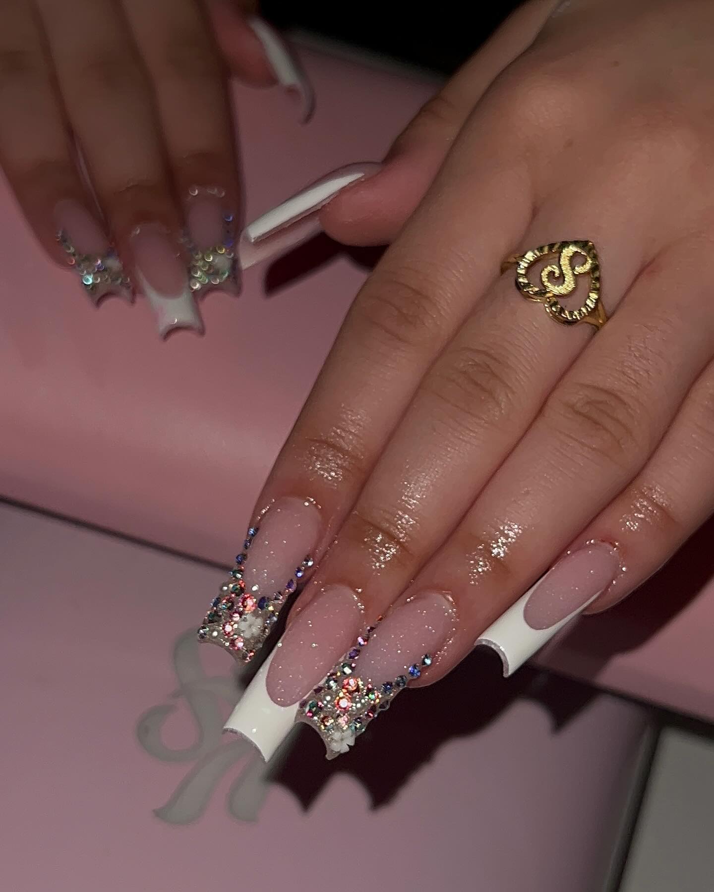 Elegant Stiletto Nails with Glitter Ombre and Rhinestones