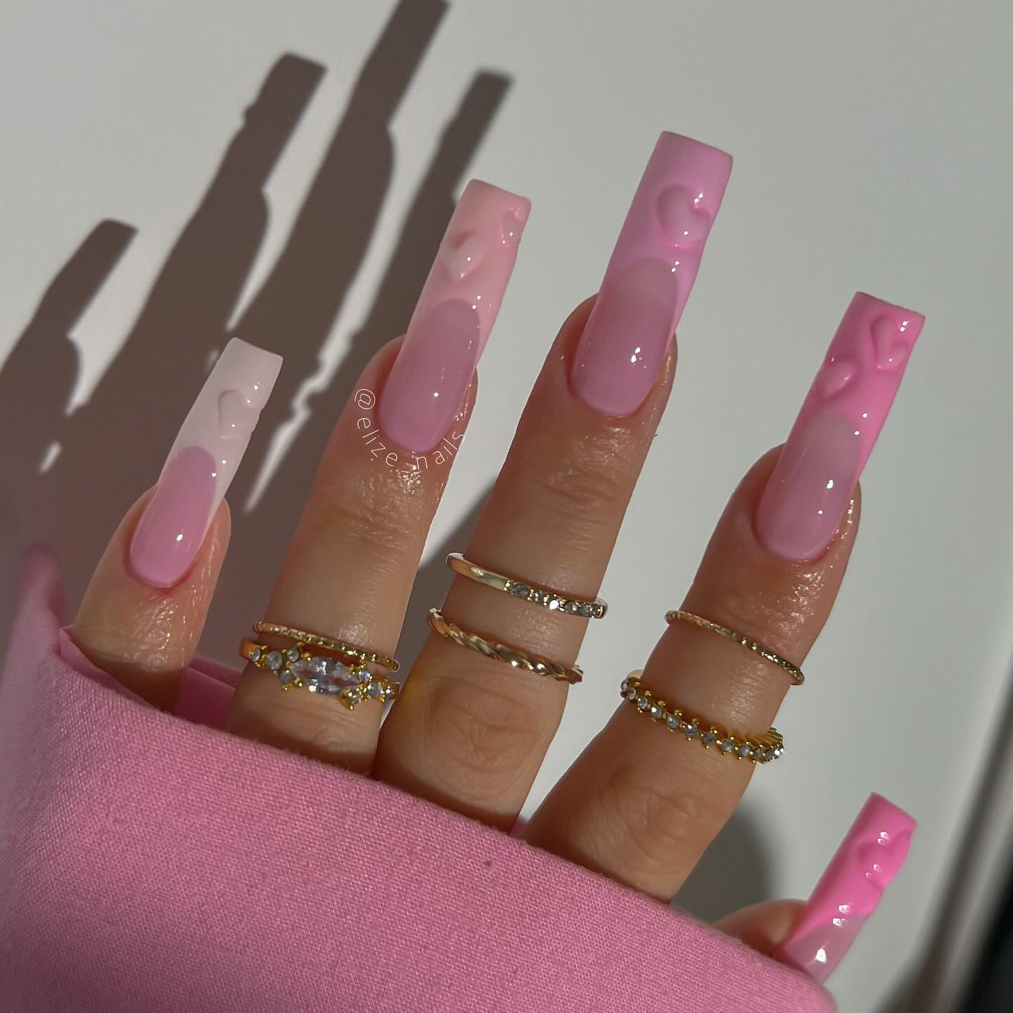 Glossy Pink Ombre Stiletto Nails with Drip Design