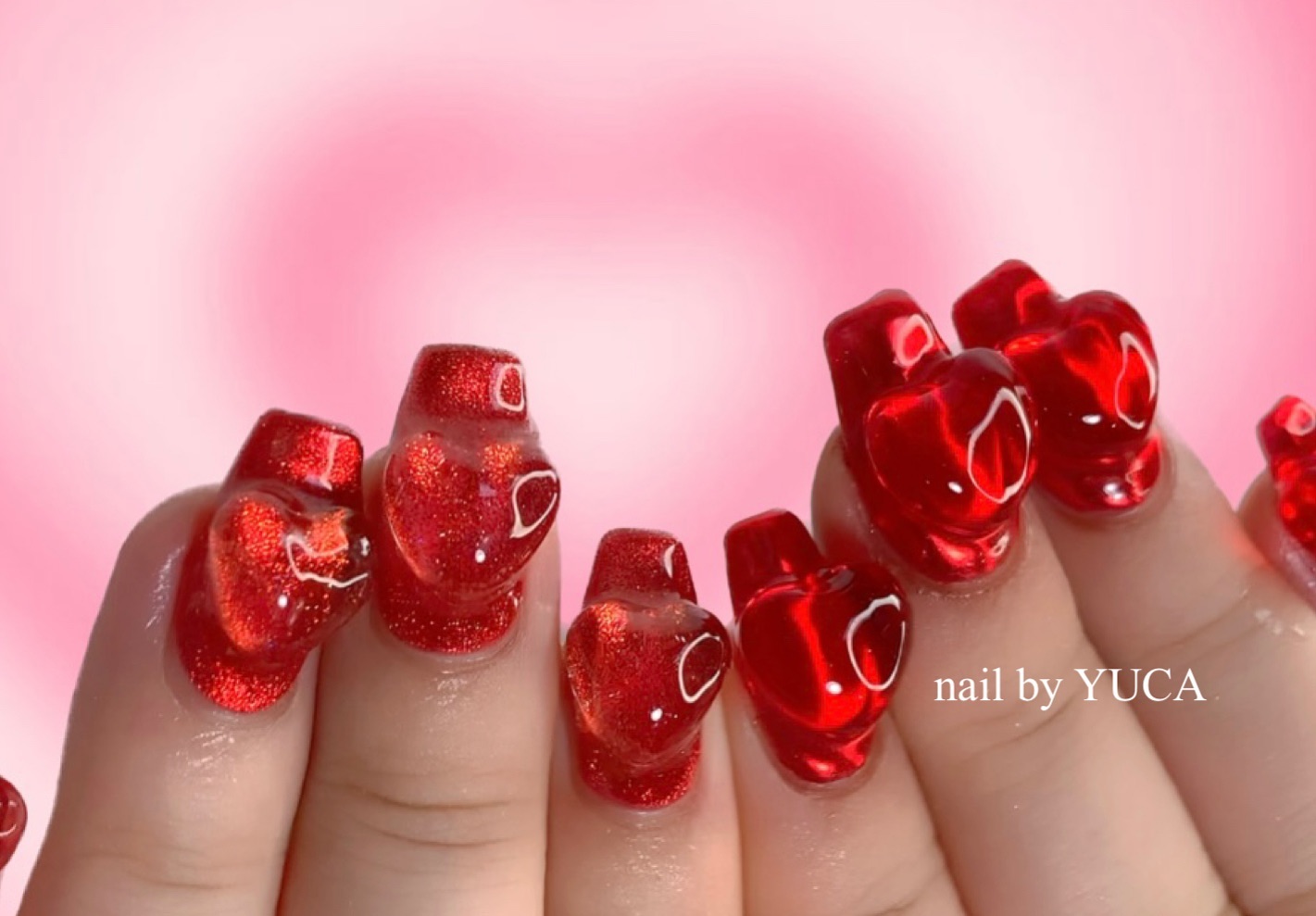 Love-Infused Red Glitter Nails with 3D Hearts