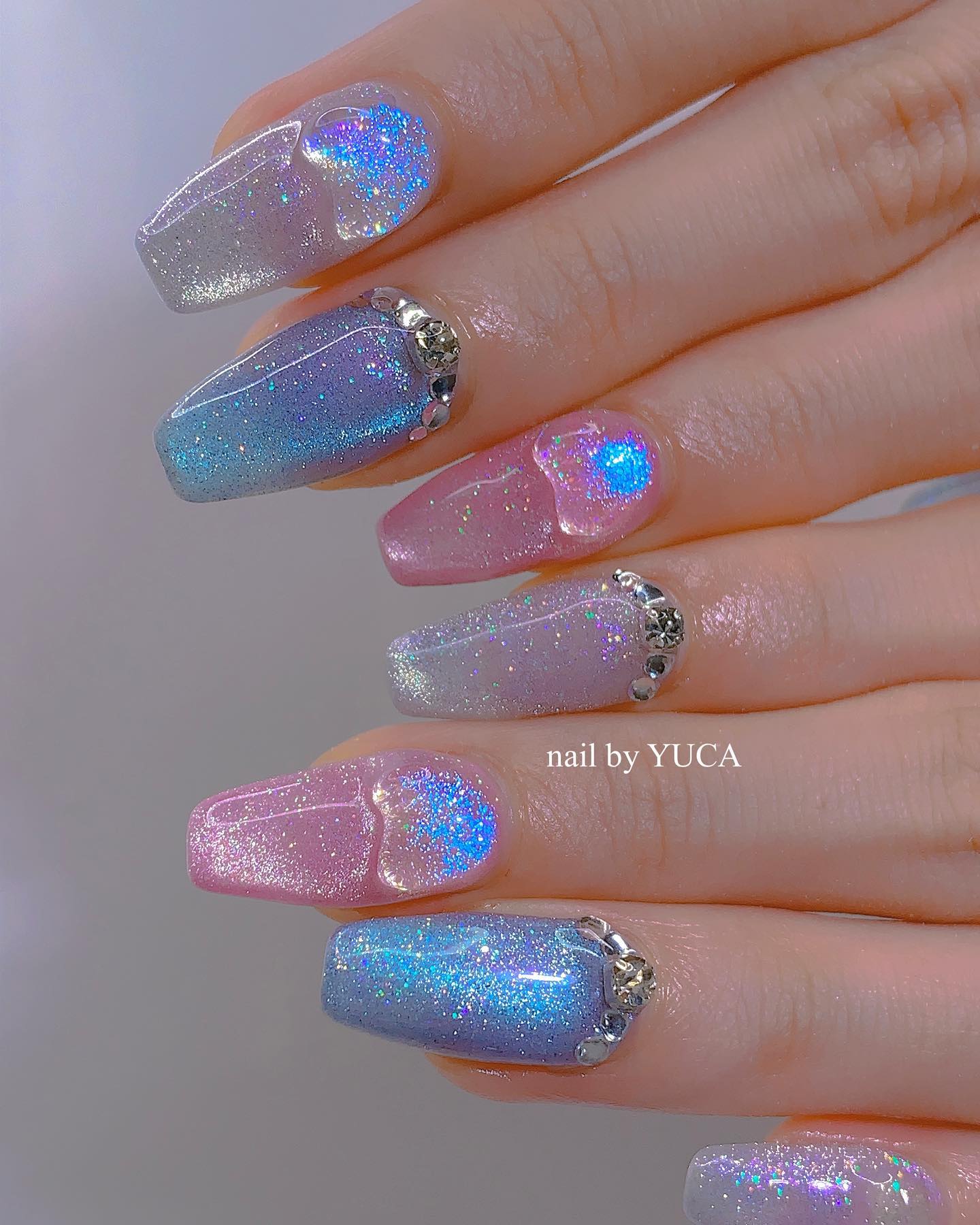 Magical Glitter Ombre Nails with Rhinestone Accents