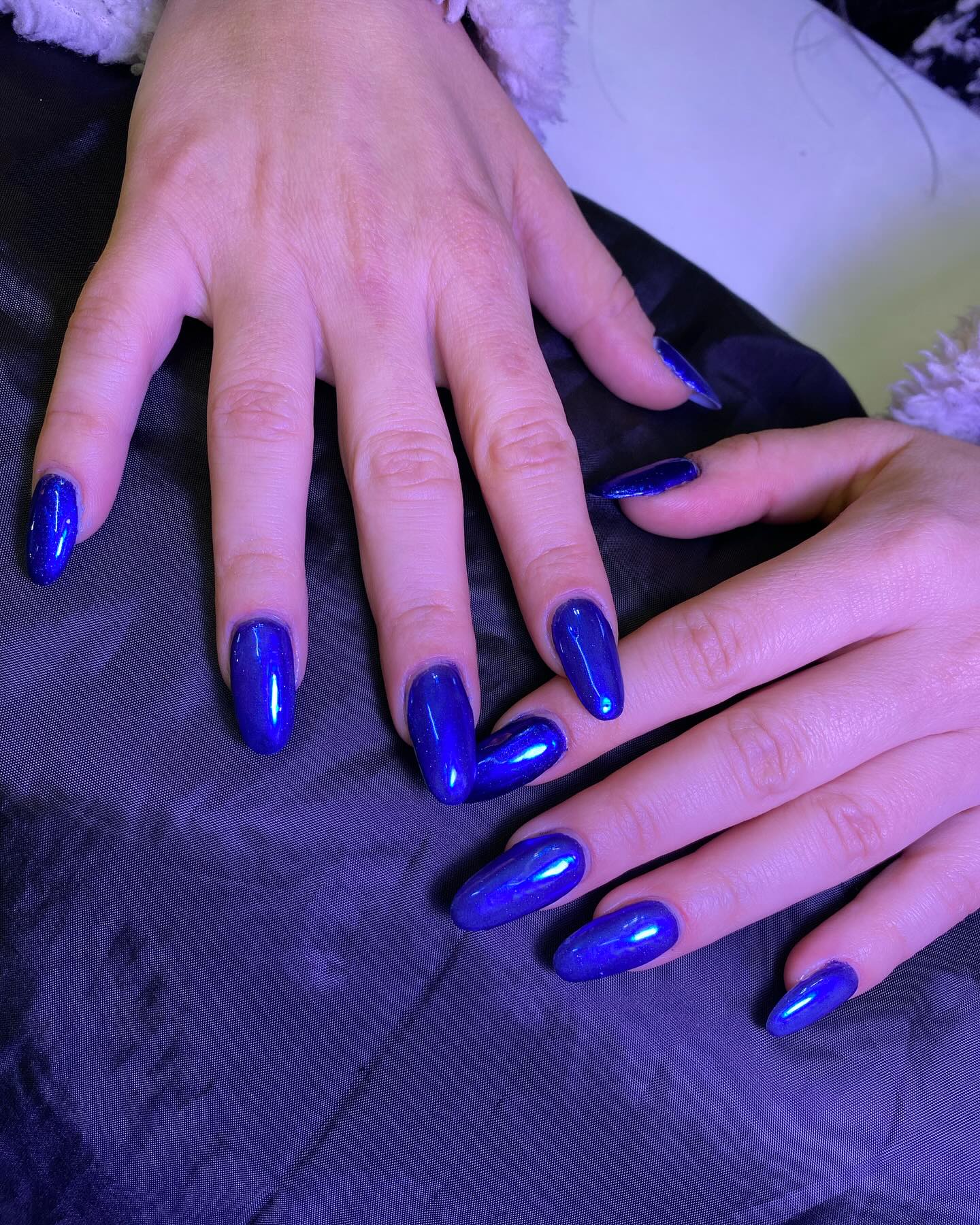 Metallic Blue Almond-Shaped Manicure Excellence