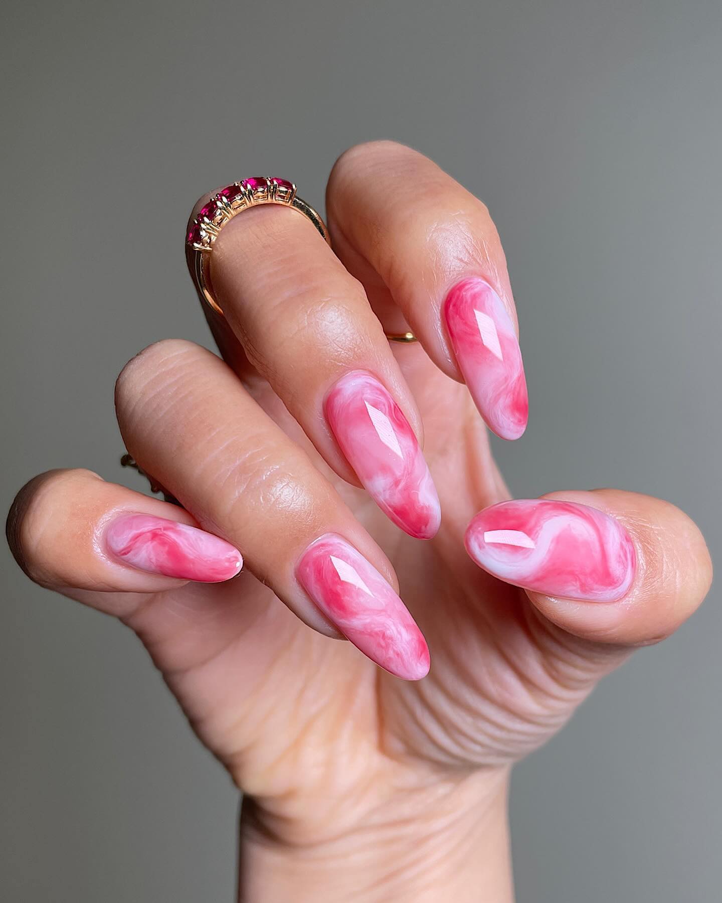 Pink Swirl Marble Elegance on Almond Nails