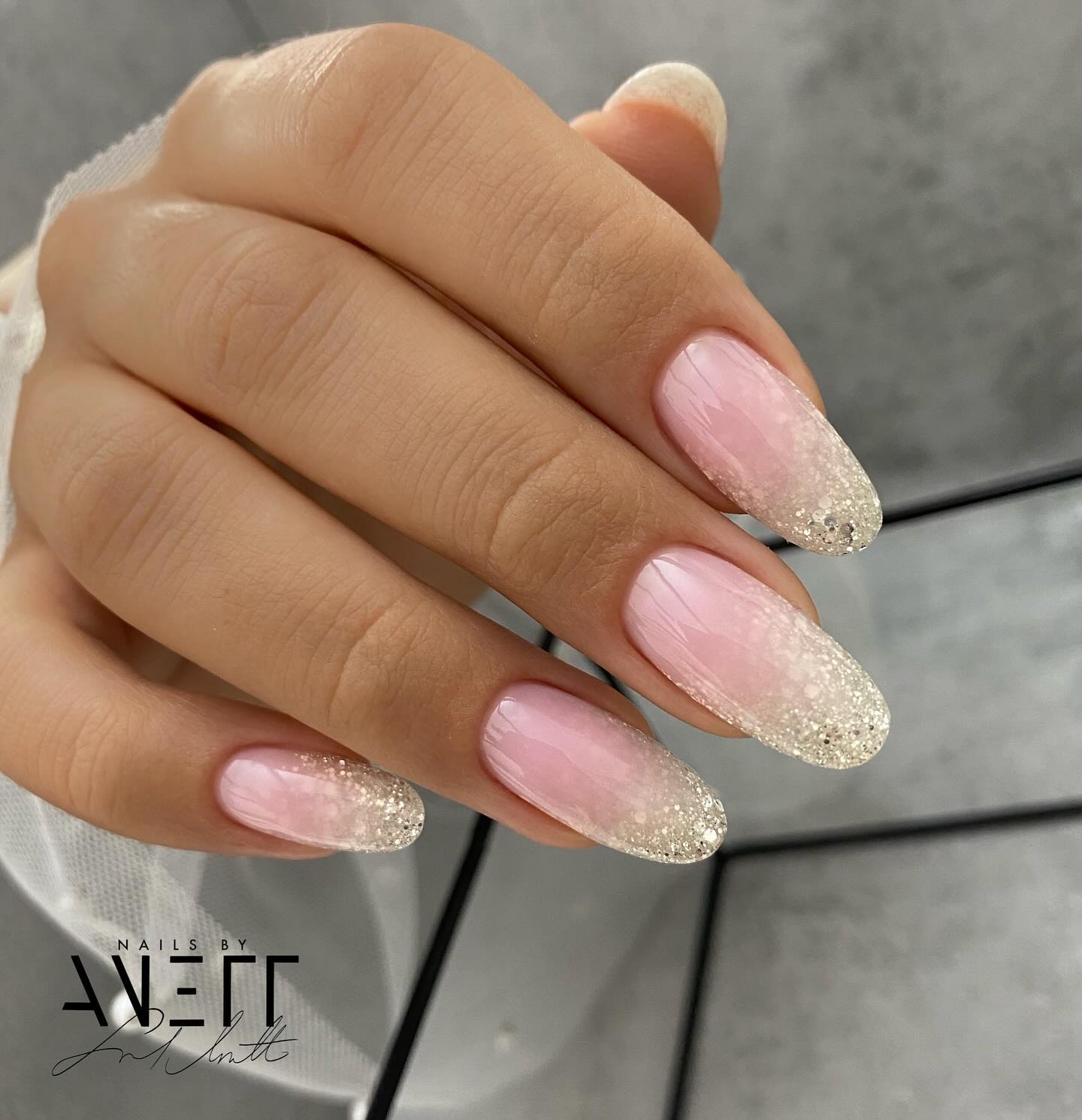 Soft Pink Glitter Ombre Nails for a Touch of Elegance