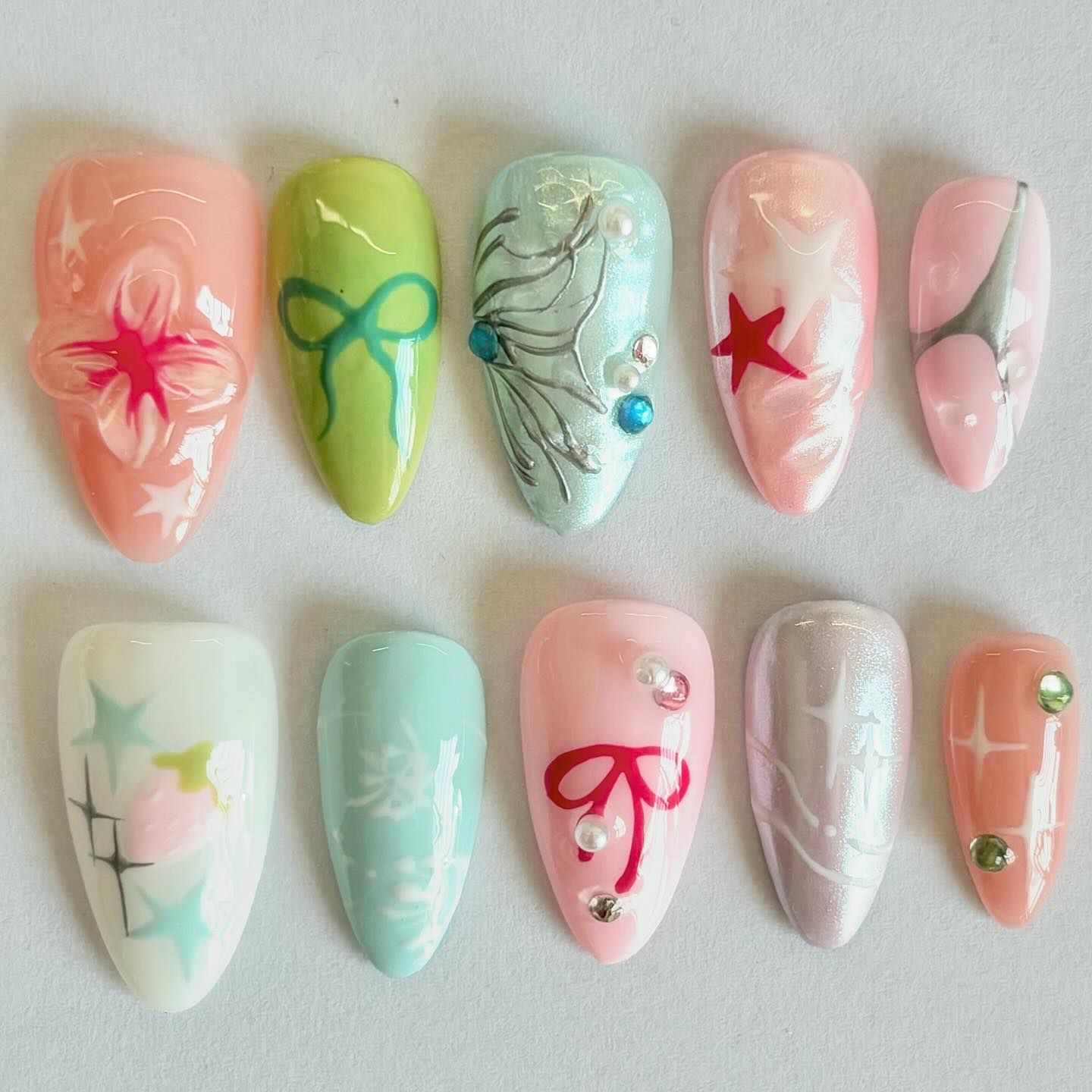 Spring Whimsy with Pastel Nail Art and Dazzling Accents
