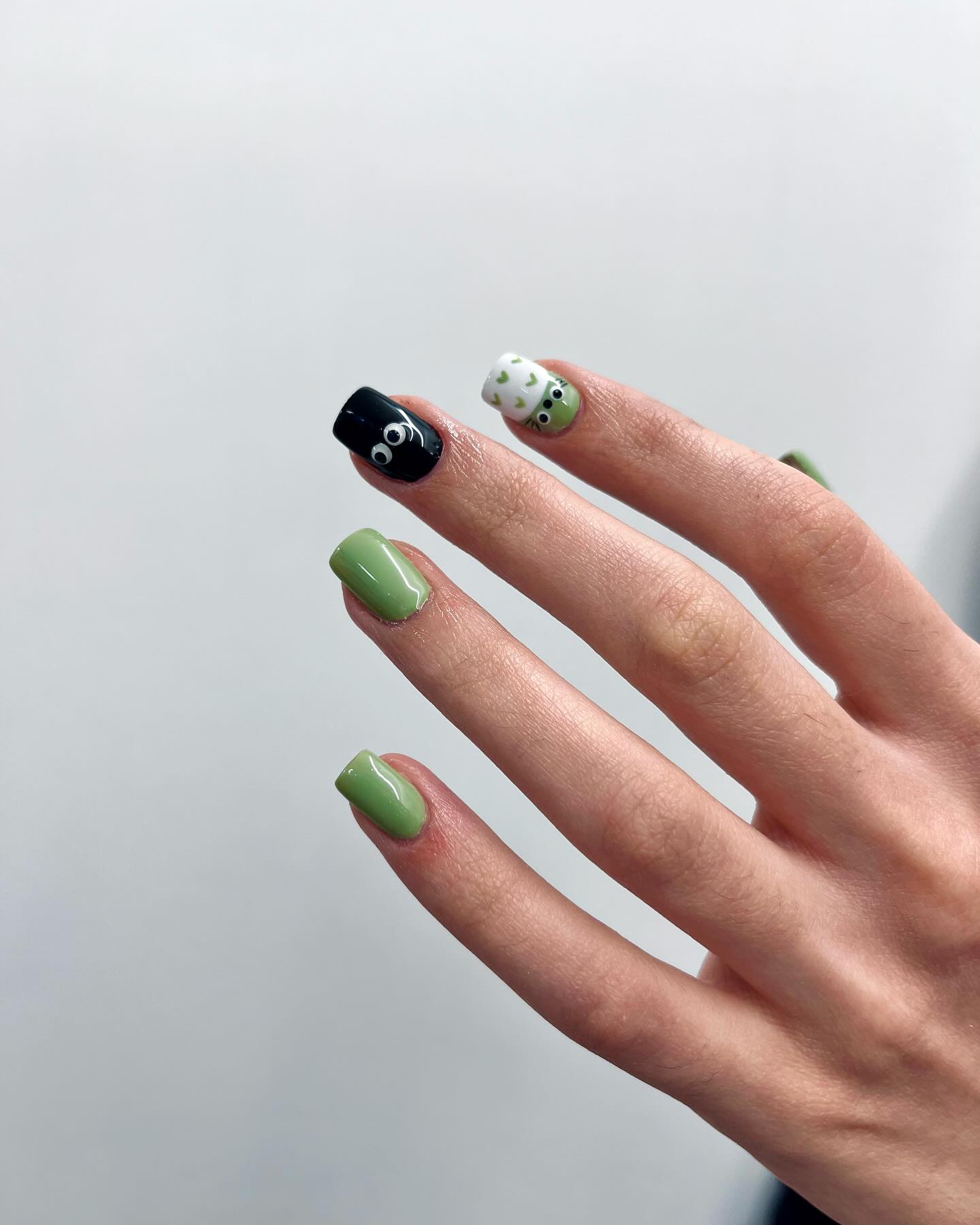 Whimsical Green with Polka Dots and Smiley Nail Art