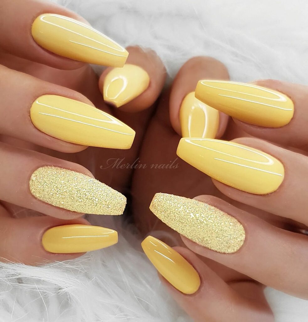Vibrant Yellow and Sparkling Gold Nail Art