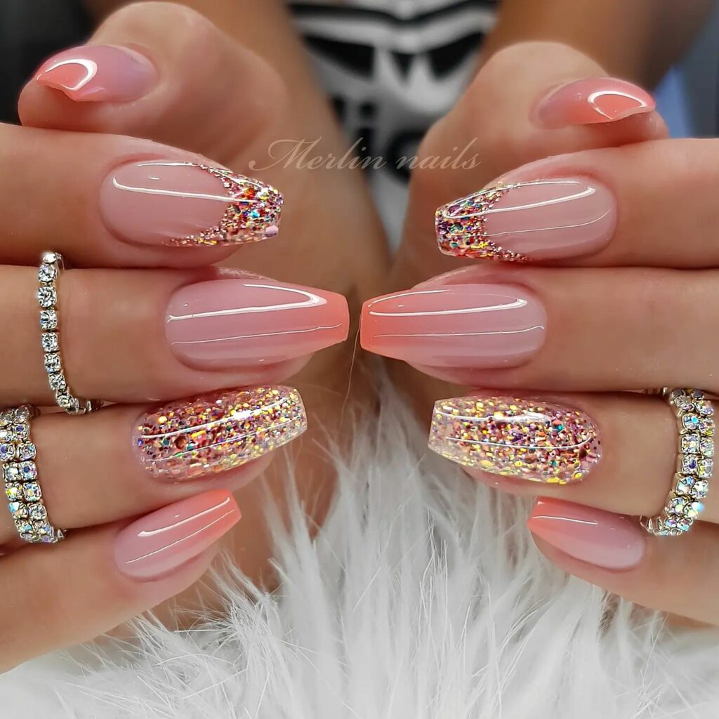 Glossy Pink Base with Glitter Accents: Elegant & Glamorous Nail Art