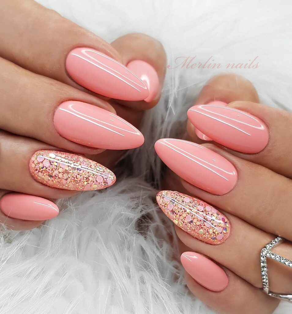 Sparkling Pink Gloss with Glitter Accents: Stylish Nail Art